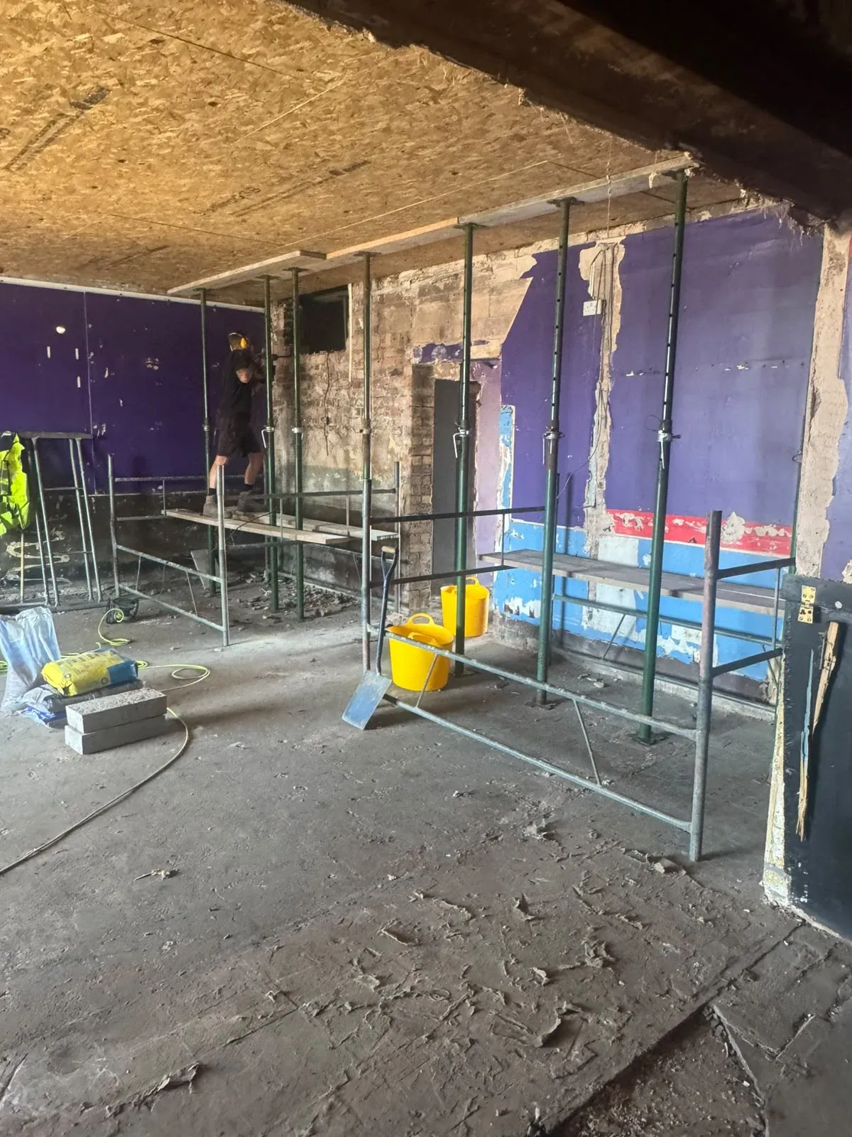 Propping to the first floor with new structural openings formed