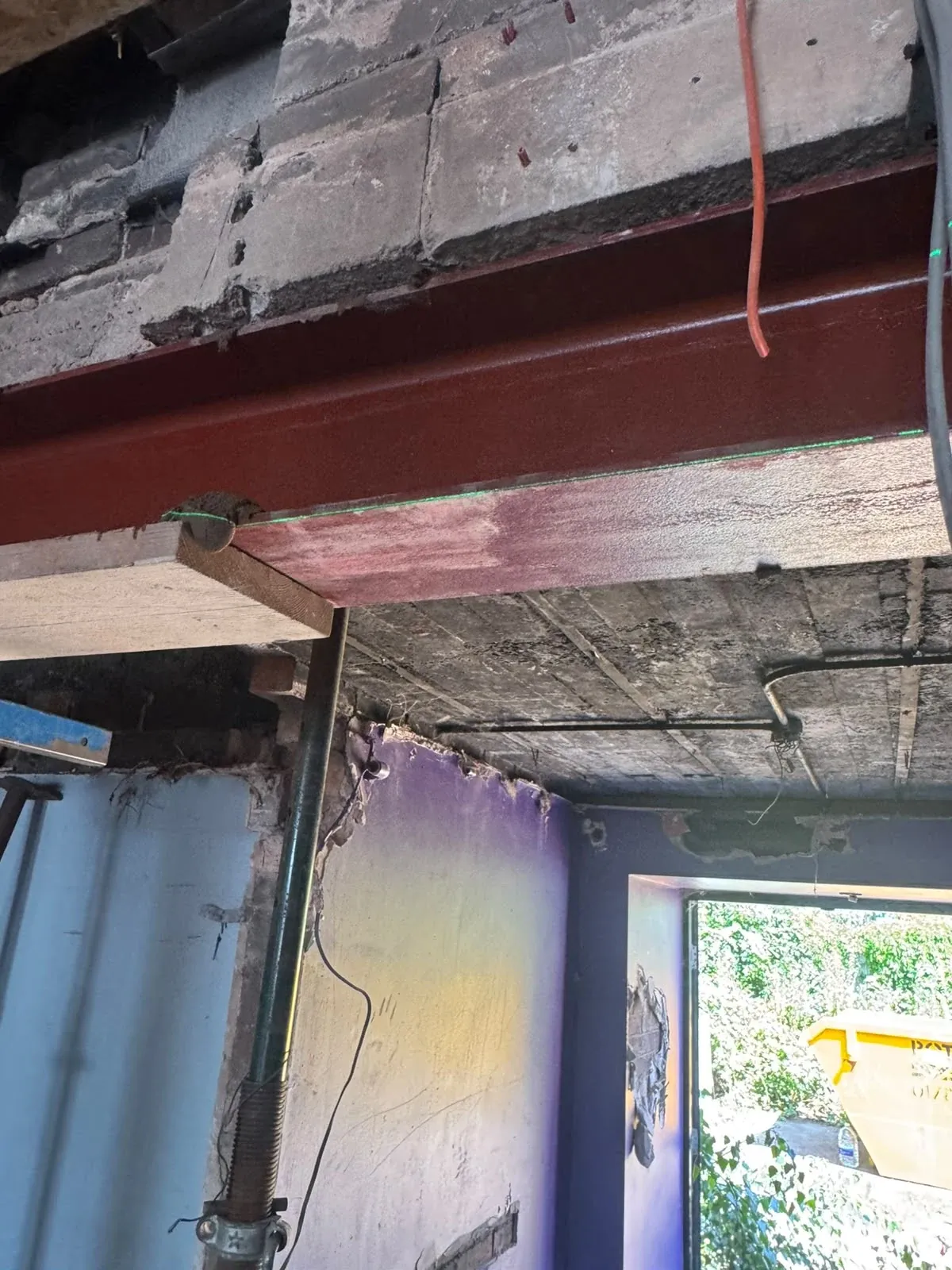 A new opening formed in a masonry wall with propping either side