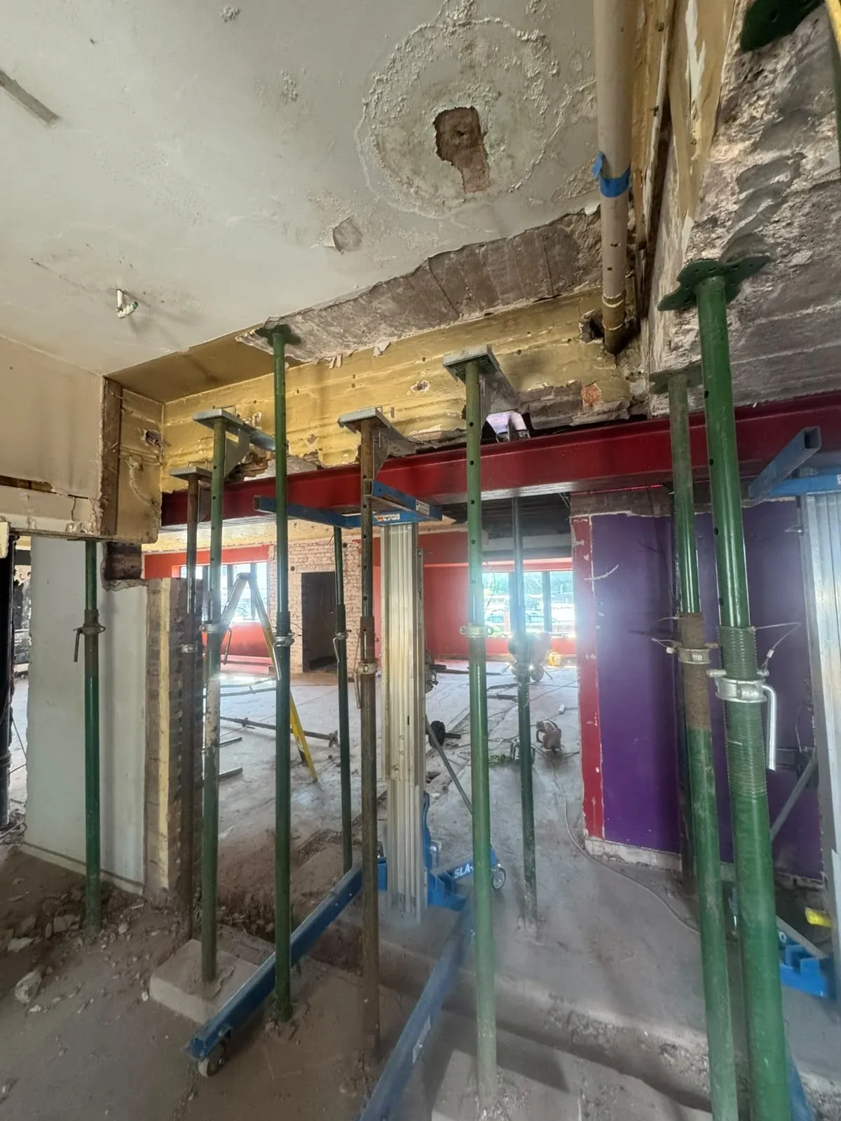 Temporary propping and steelwork across the ground floor of the former pub